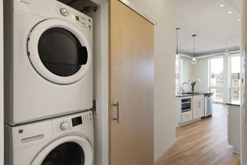 High efficiency full size washers, dryers in every unit